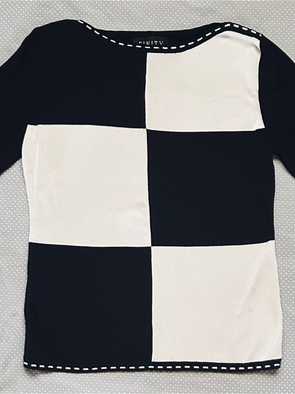 Finity Black & White Checker Knit Boat Necked Sweater with 3/4
Sleeves